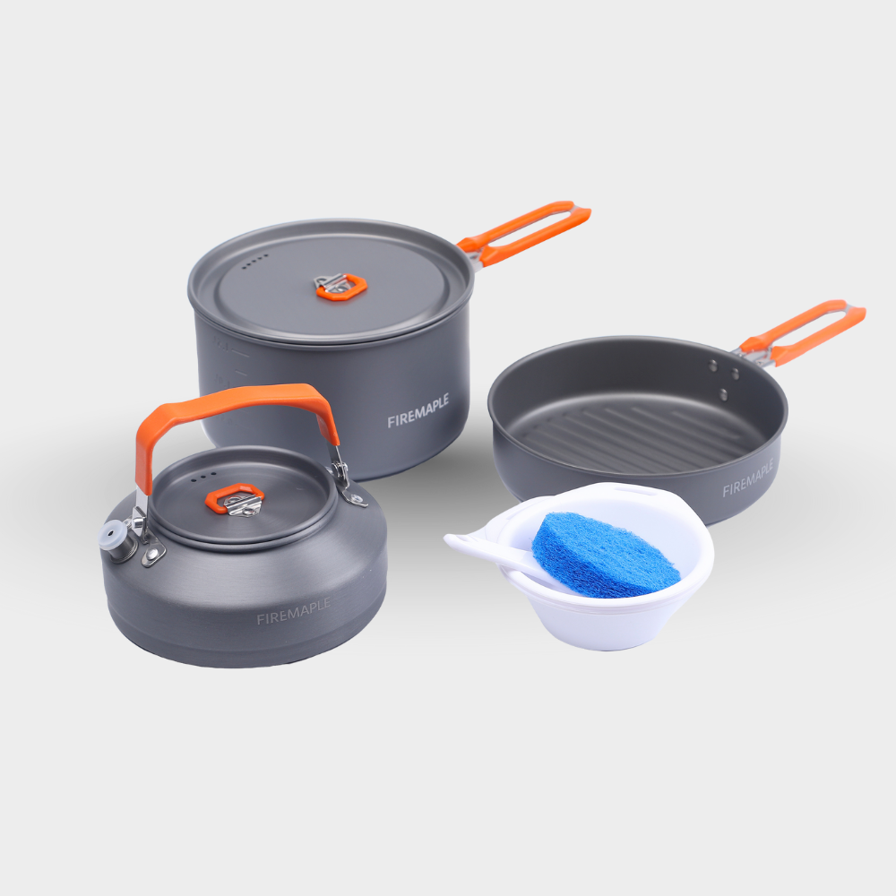 Set of camping cookware with gray pots and pans and orange handles on a white background. #color_orange
